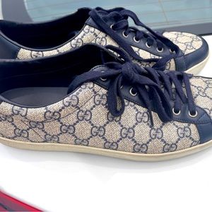 Mens GG canvas fashion sneaker. Worn once. The style is dress casual with laces.